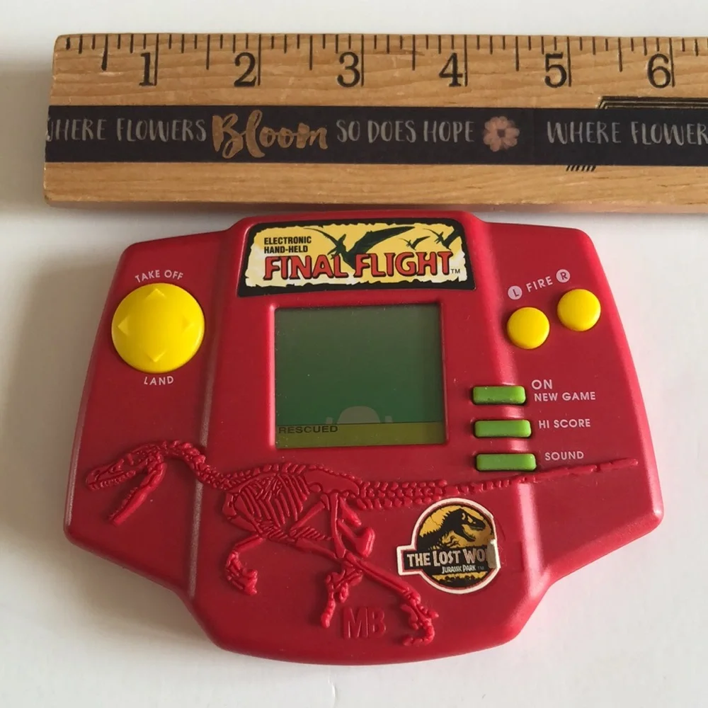 Jurassic Park The Lost World Electronic Hand Held Game 1996 Milton Bradley VTG